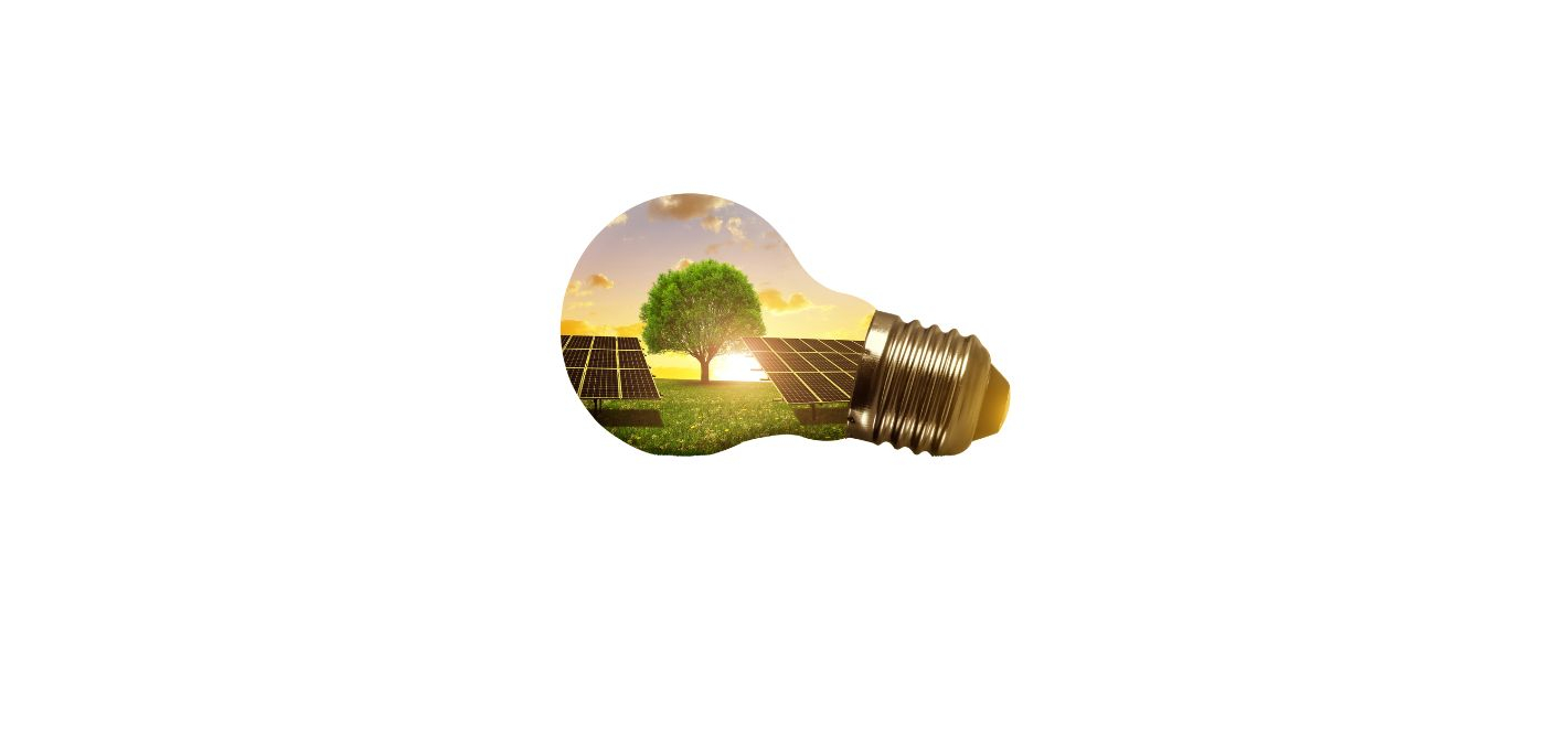 Ampoule symbolique contenant un paysage solaire et écologique – illustration des avantages de l’éclairage solaire extérieur